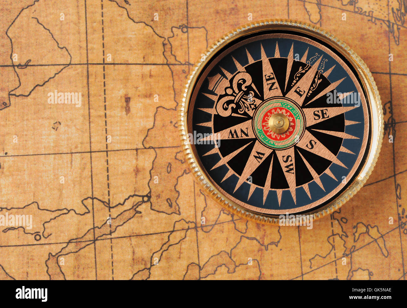 Old compass and map Stock Photo - Alamy