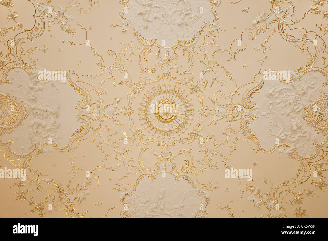 Ceiling with a gold ornament Stock Photo - Alamy
