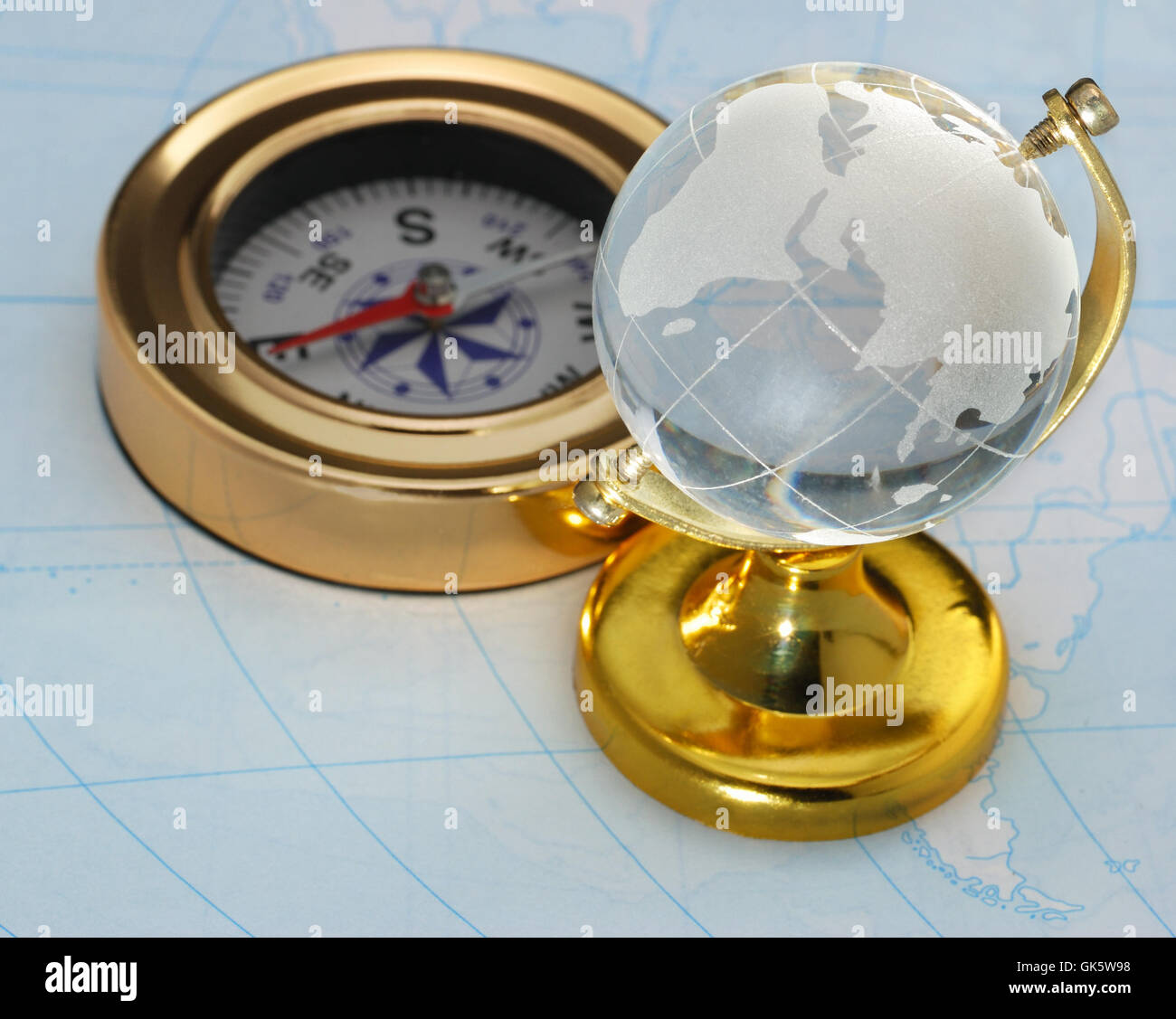 Compass and globe Stock Photo