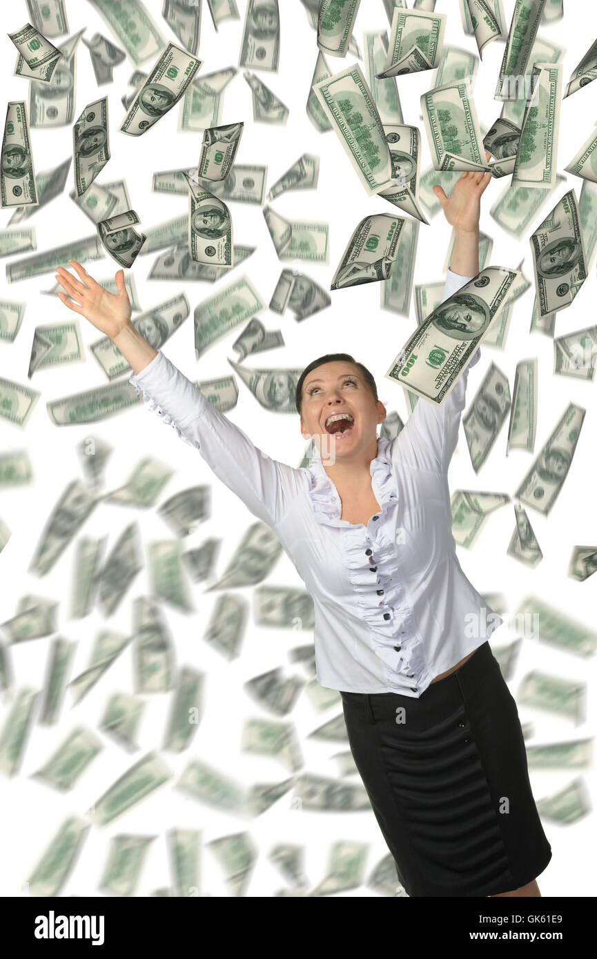 The woman and is a lot of money falling from above Stock Photo - Alamy