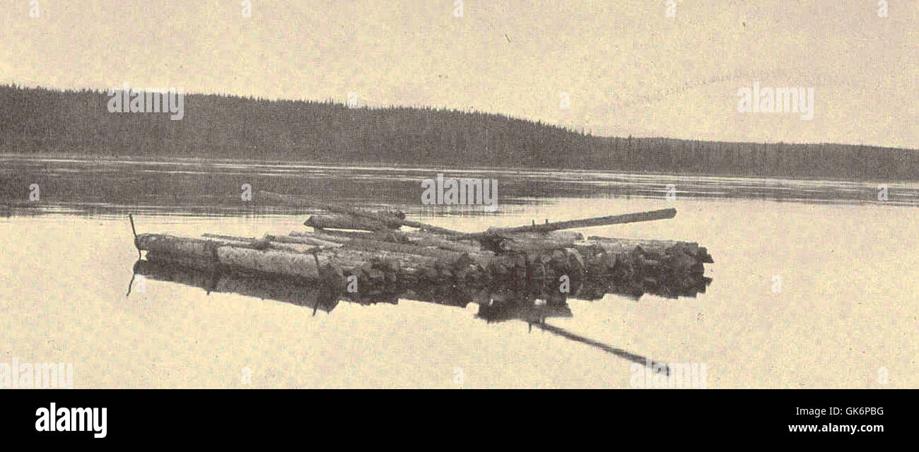 Damaged Log Raft This image depicts a raft of logs, originally intended for building ...