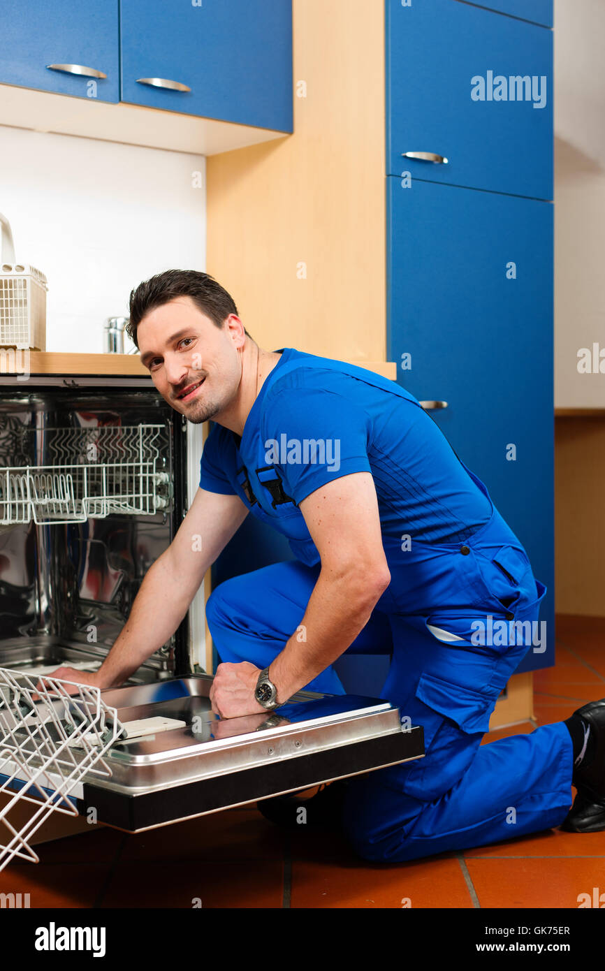 plumber automatic dishwasher dishwasher Stock Photo Alamy