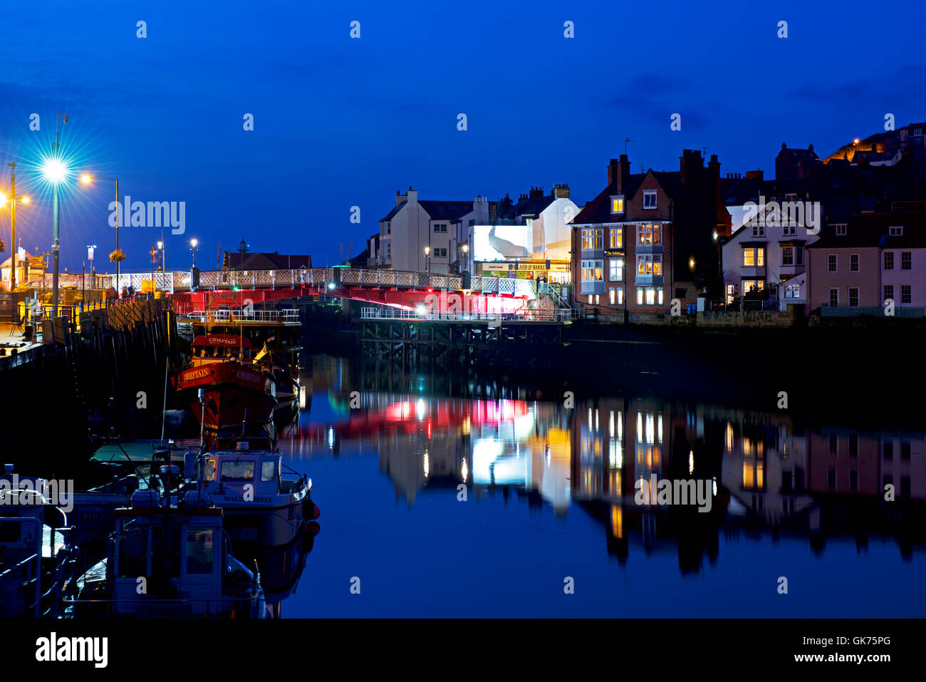 The river Esk, Whitby, at night, North Yorkshire, England UK Stock Photo