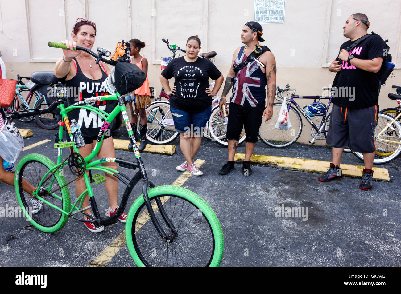 Miami Florida,Hialeah,Leah Arts District,community block party,street fair,Hispanic adult adults,woman female women,man men male,tall bike,bicycle,bic Stock Photo