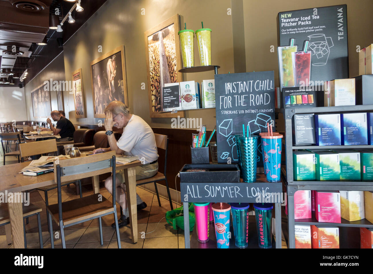 Miami Florida,Westchester,Starbucks Coffee,company,coffeehouse,cafe,chain,table,chair,adult,adults,man men male,customer,products,brand,promotion,Teav Stock Photo