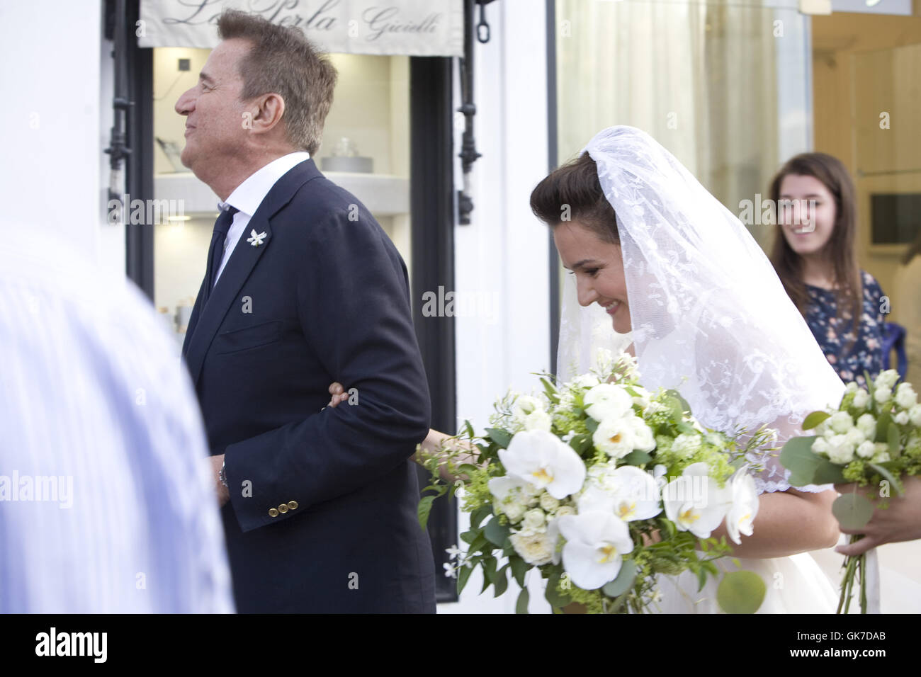 The wedding of Italian actor/director Christian De Sica and Mariu De Sica  Featuring: Christian De Sica, Mariu De Sica Where: Anacapri, Italy When: 04 Jun 2016 Credit: IPA/WENN.com  **Only available for publication in UK, USA, Germany, Austria, Switzerlan Stock Photo
