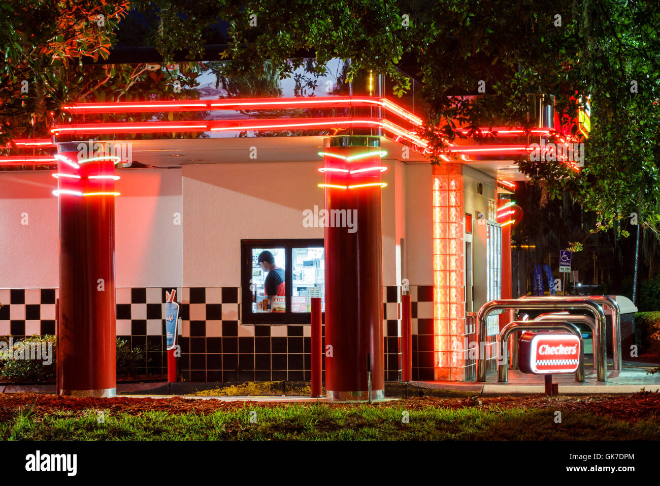 Florida Ellenton,Checkers,hamburgers,fast food,restaurant restaurants dining cafe cafes,chain,building,exterior,lit sign,branding,neon,adult,adults,ma Stock Photo
