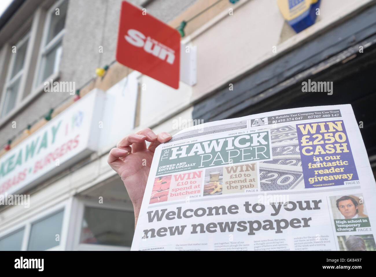 Hawick, UK. 19th August, 2016. New newspaper for Hawick . The first new paper in the town for around 30 years, it will feature community news, sports, letters and features. On sale at a open air 'newsagent' in Burnfoot, with a big interest locally. Not giving the tabloids a run, but a positive feeling in the town. Credit:  Rob Gray/Alamy Live News Stock Photo