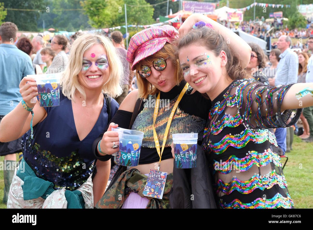 Green Man Festival, Wales, UK August  2016.   Young fans enjoy the live music and beer at the Mountain Stage - Over 25,000 music fans are due to attend over the weekend. Stock Photo