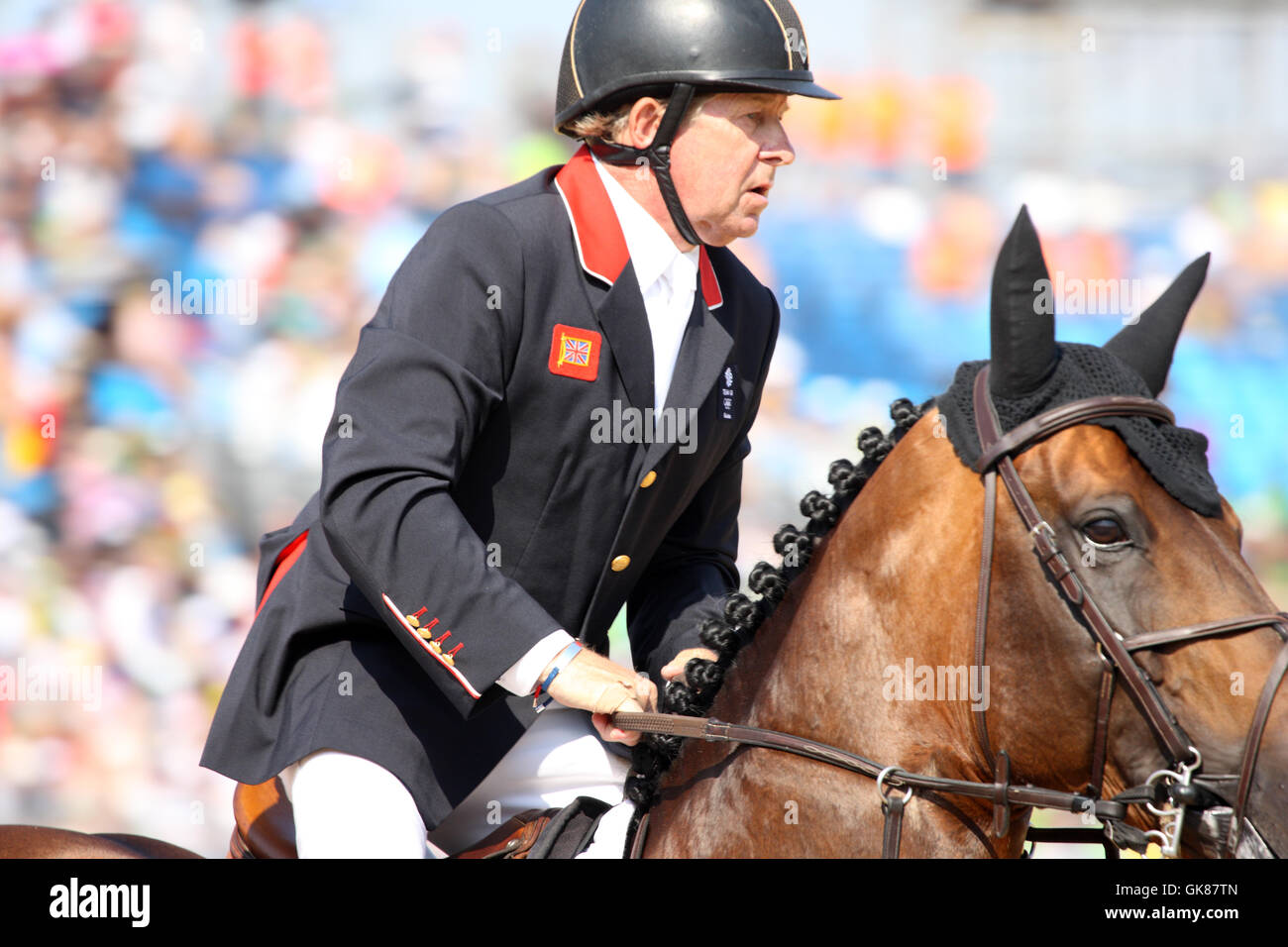Rio de Janeiro, Brazil. 19th August, 2016. Concentration on the face of Nick Skelton from GBR on 'Big Star' in Round B of the Olympic Equestrian Show Jumping Final in Rio de Janeiro, Brazil. Stock Photo