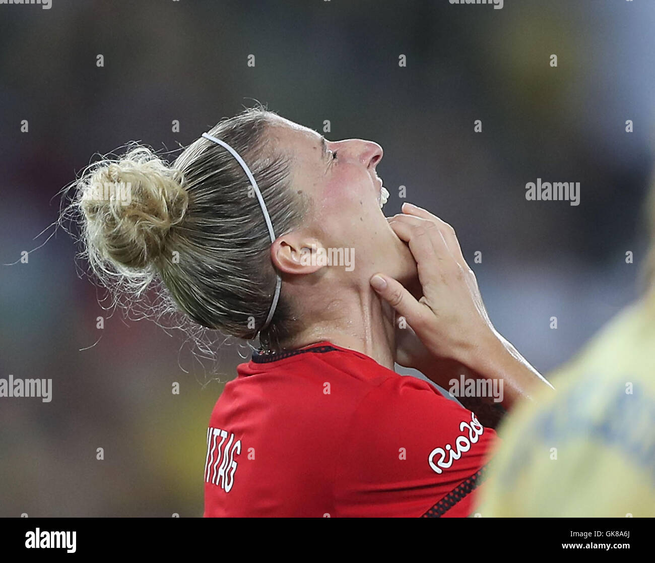 Rio De Janeiro, Brazil. 19th Aug, 2016. Germany's Anja Mittag (L) reacts during the women's gold medal match of football between Germany and Sweden at the 2016 Rio Olympic Games in Rio de Janeiro, Brazil, on Aug. 19, 2016. Credit:  Cao Can/Xinhua/Alamy Live News Stock Photo