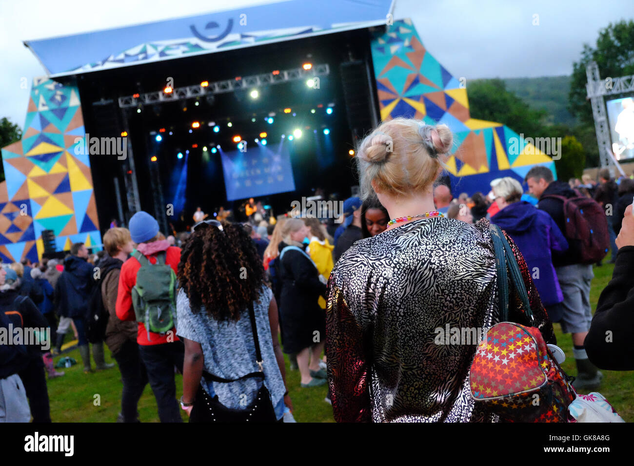 Green Man Festival, Wales, UK August 2016.   As evening falls fans watch the live music on the Mountain Stage - Over 25,000 music fans are due to attend over the weekend. Stock Photo