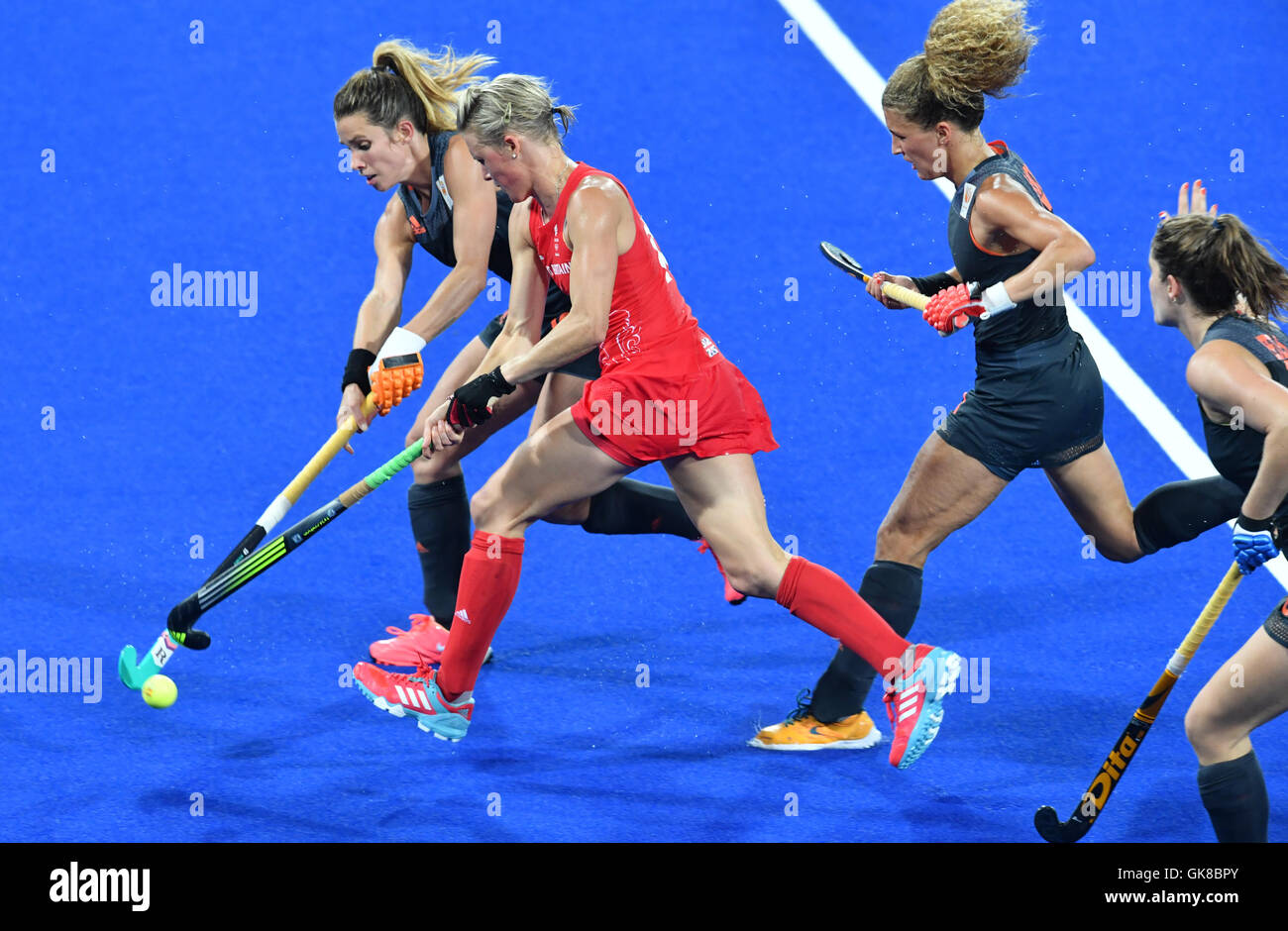 Rio de Janeiro, Brazil. 19th Aug, 2016. (L-R) Ellen Hoog of the Netherlands, Alexandra Danson of Great Britain, Maria Verschoor and Marloes Keetels of the Netherlands in action during the Women's Field Hockey Gold Medal Match between the Netherlands and Great Britain at the Olympic Hockey Centre during the Rio 2016 Olympic Games in Rio de Janeiro, Brazil, 19 August 2016. Photo: Felix Kaestle/dpa/Alamy Live News Stock Photo
