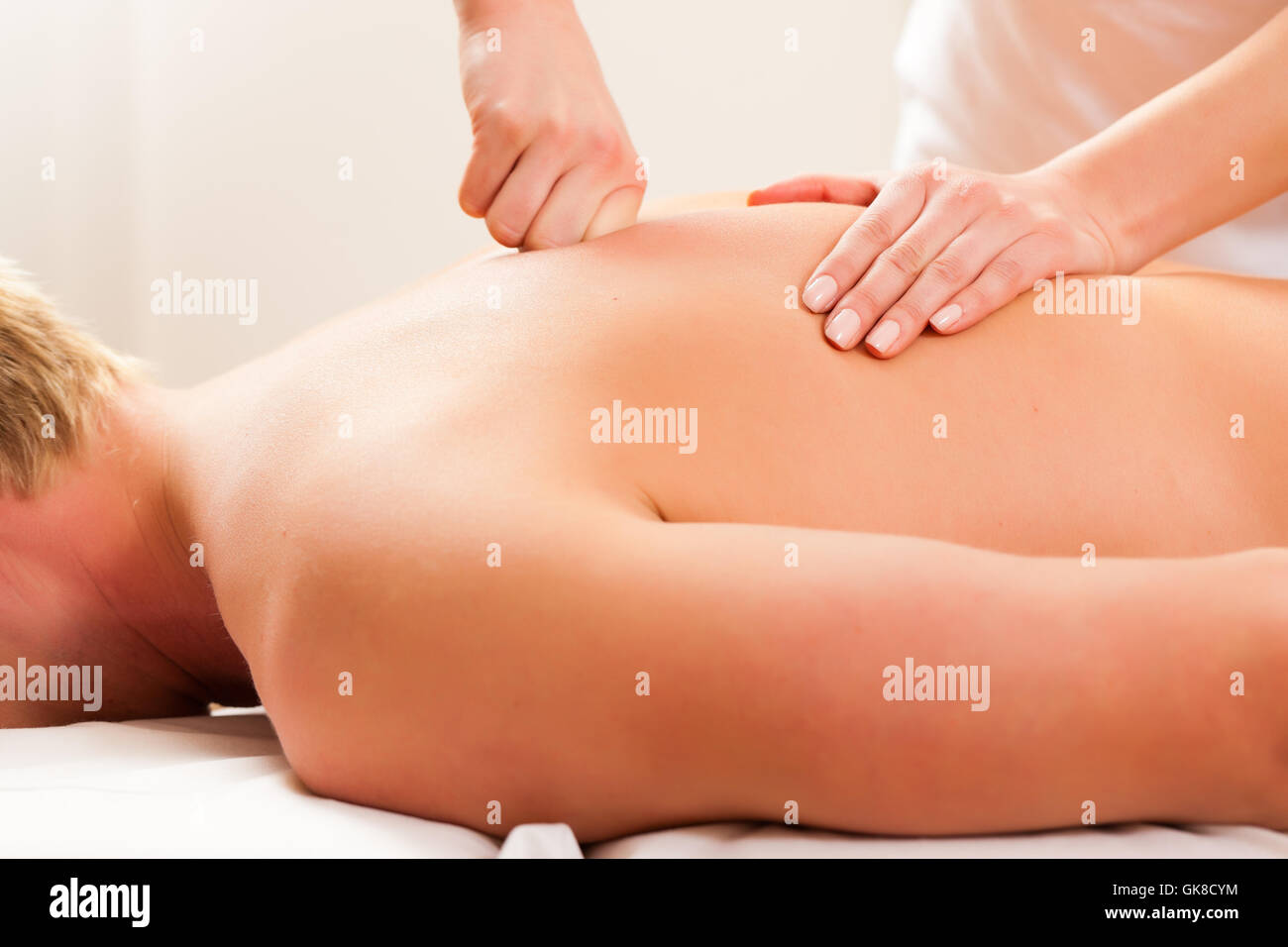patient at the physiotherapy - massage Stock Photo