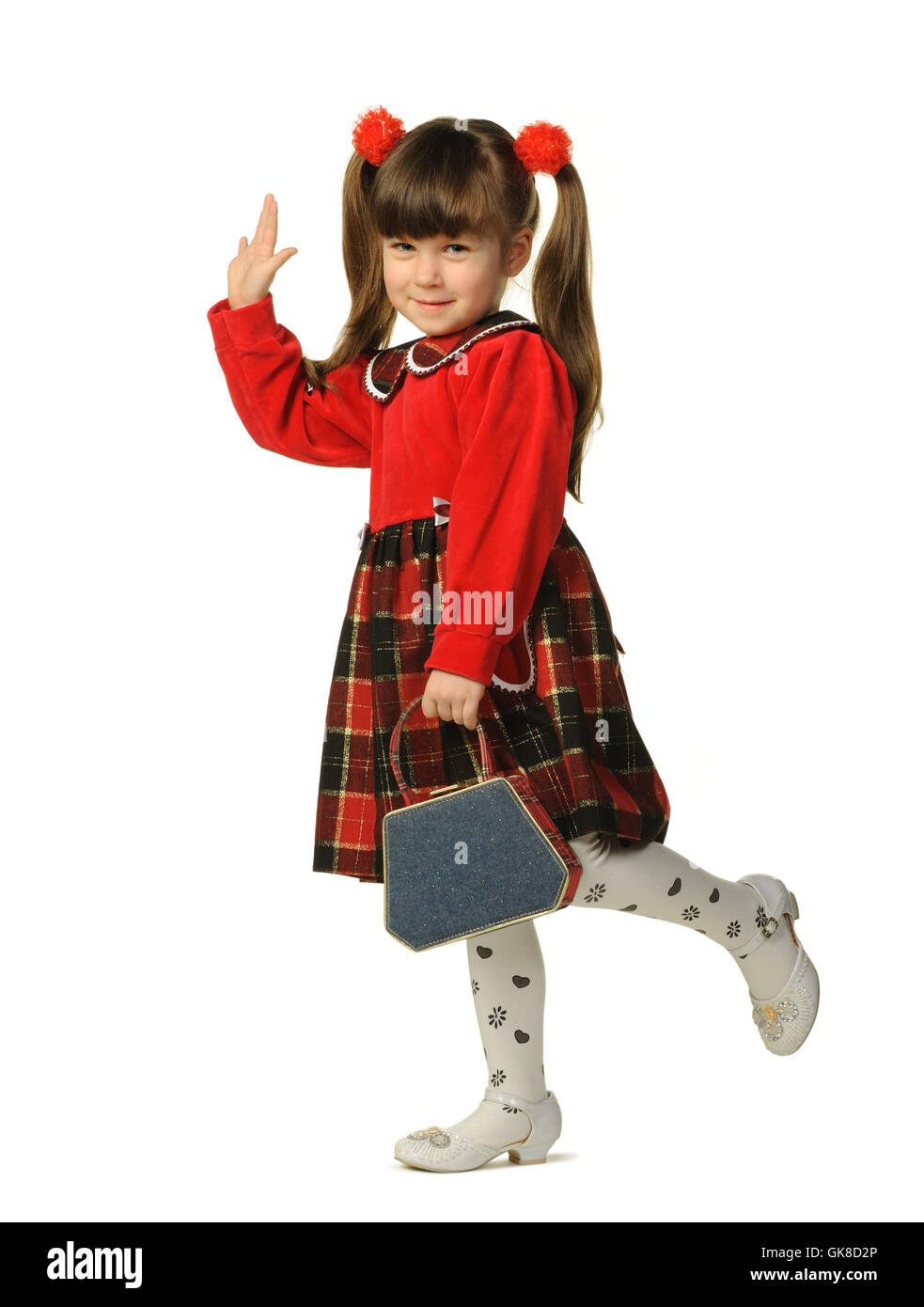 The little girl in a red dress Stock Photo - Alamy
