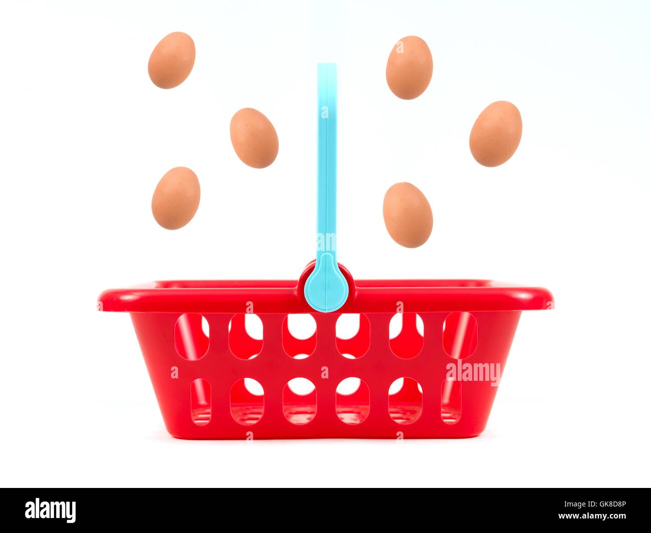 Eggs In One Basket Stock Photo - Alamy