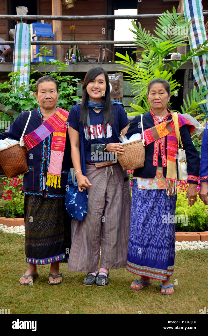 Thai young women people portrait with eldery woman phu tai in phutai day festival in morning time at Ban Non Hom on January 17, Stock Photo
