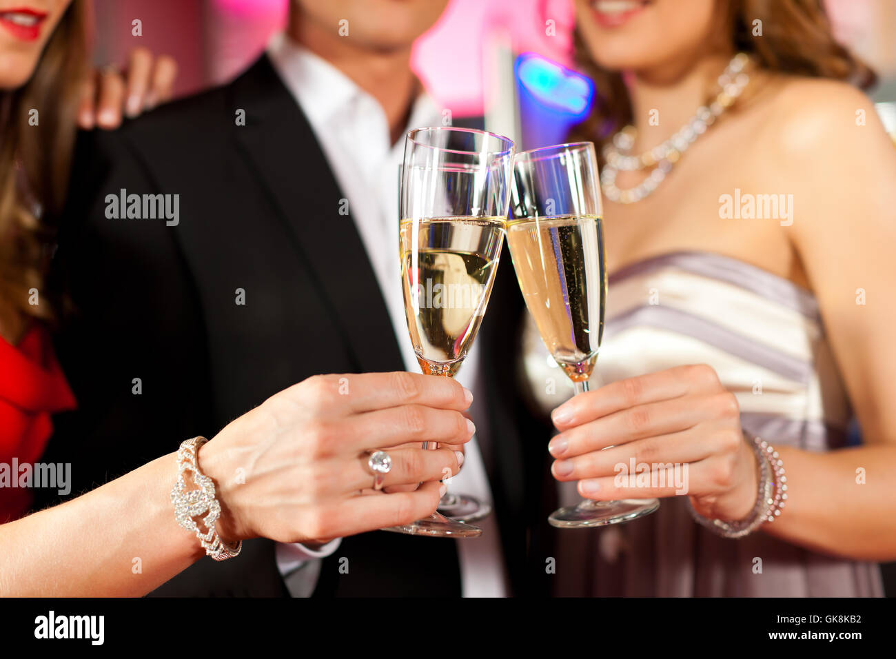 people with champagne in a bar Stock Photo