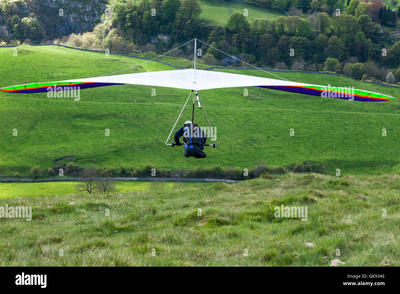 Hang gliding in the Peak District. Hang glider just after take off at Bradwell Edge in Derbyshire, England, UK Stock Photo