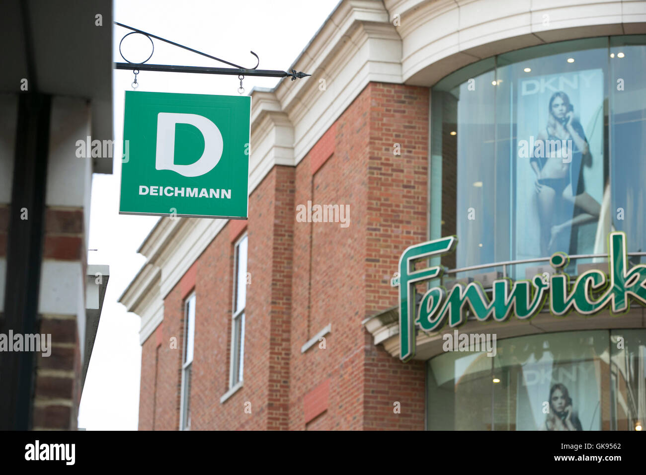 Picture of the Deichmann sign with Fenwick in the background in Whitefriars Canterbury Stock Photo