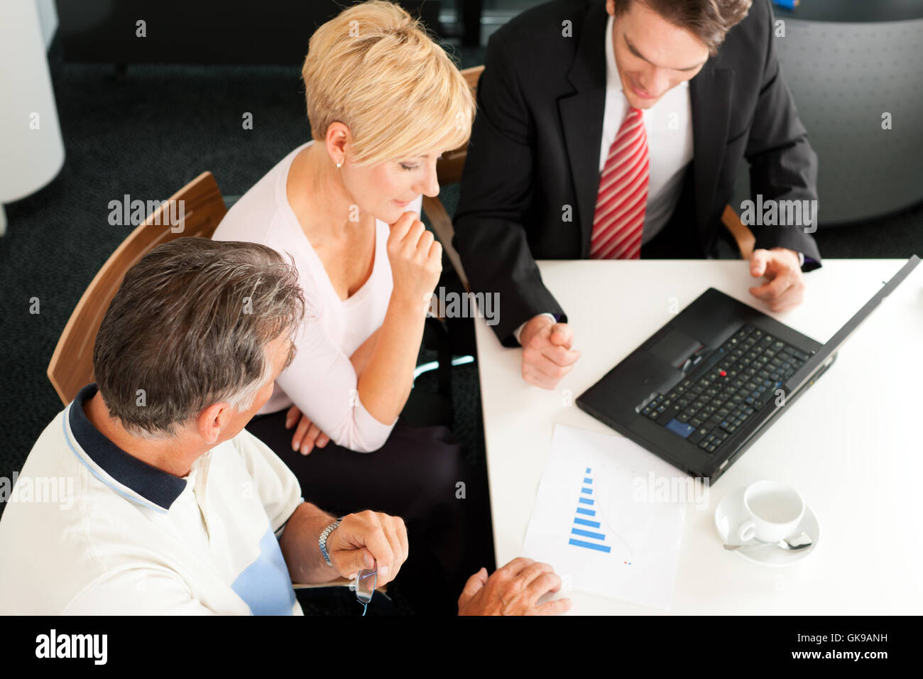 elderly couple at financial advisor Stock Photo Alamy