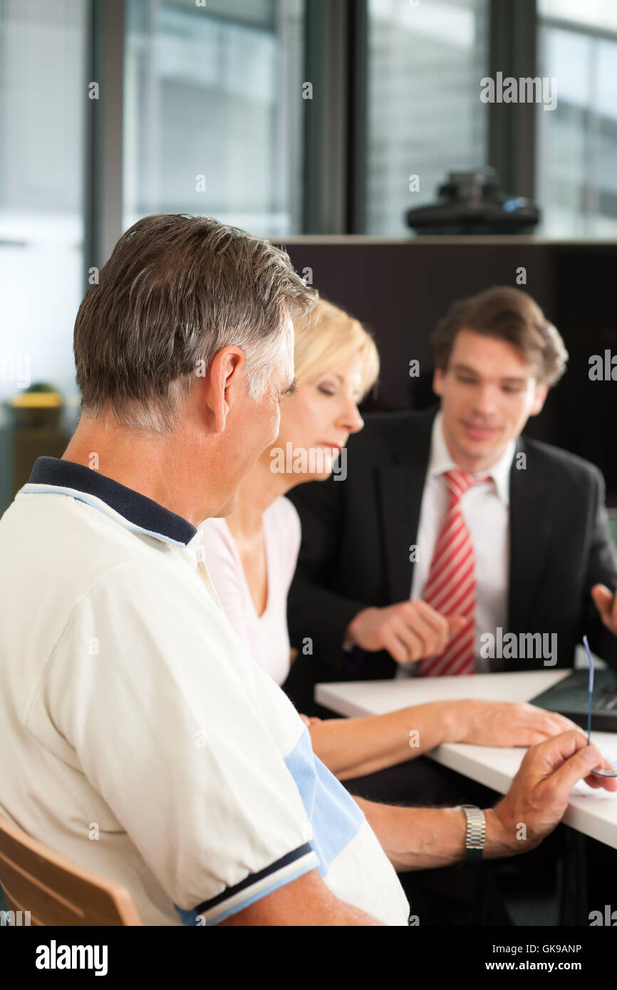 elderly couple at financial advisor Stock Photo Alamy