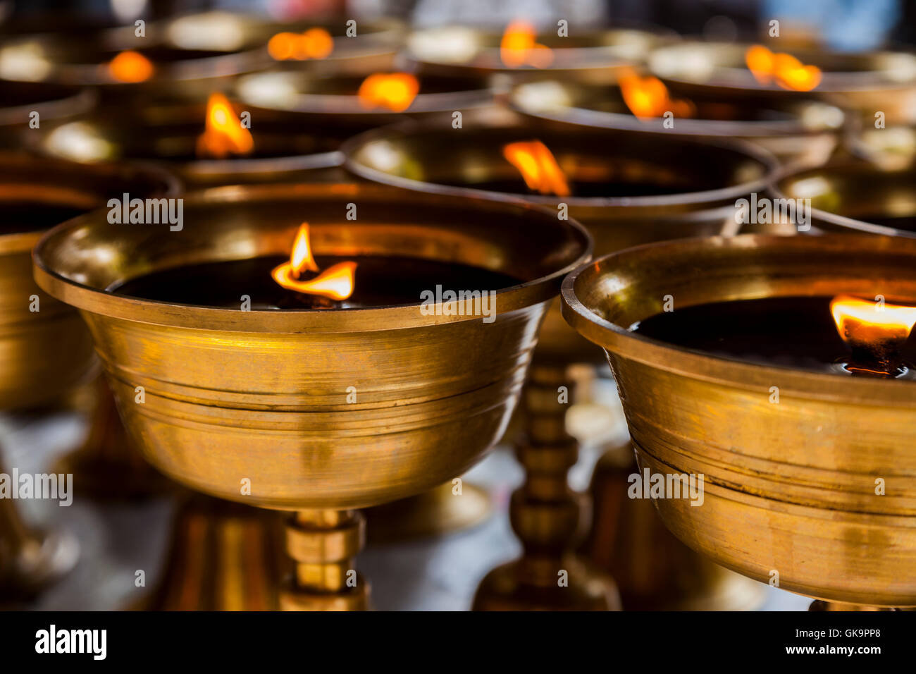 Flaming gold oil lamps hires stock photography and images Alamy