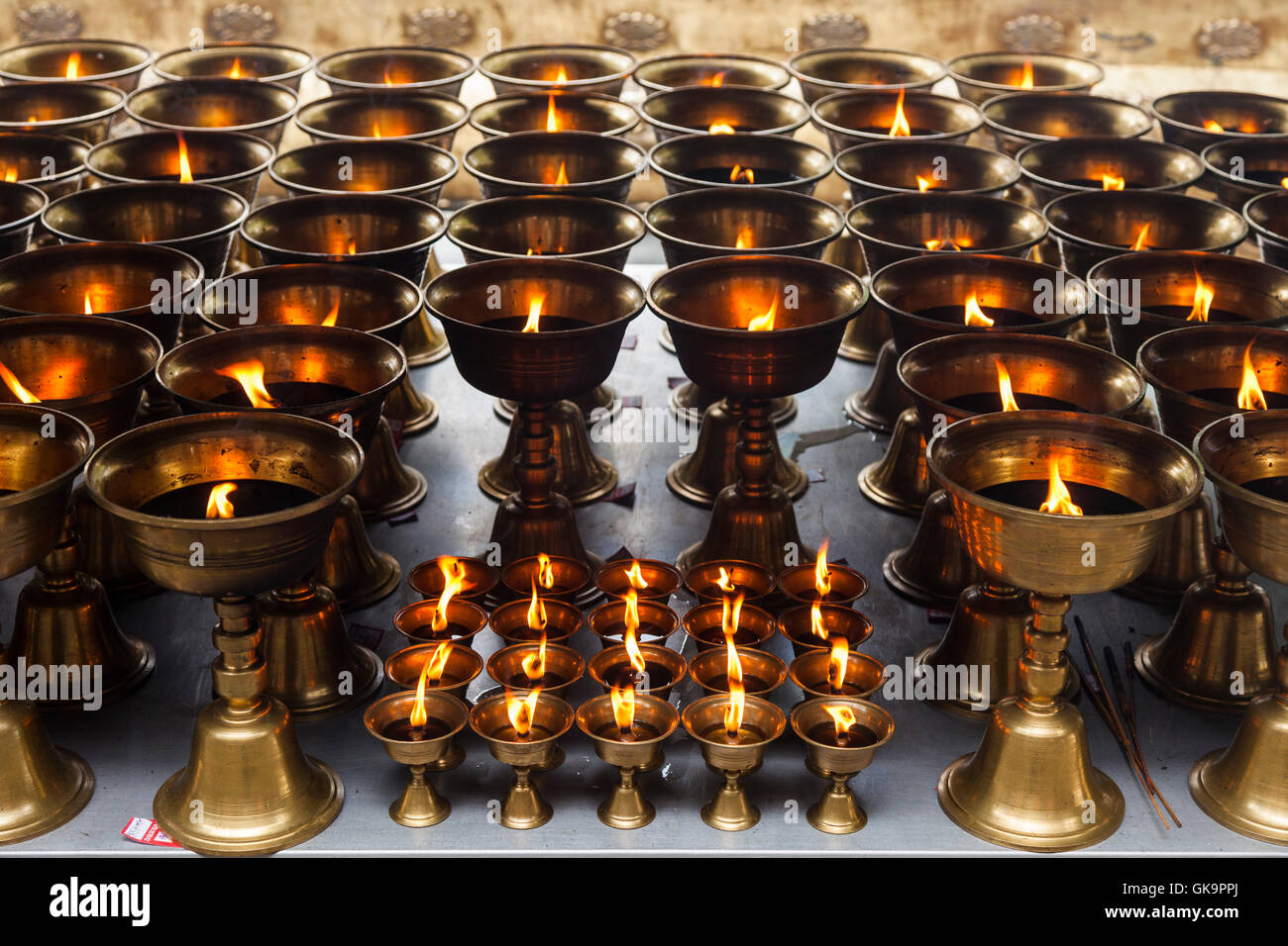 Flaming gold oil lamps hires stock photography and images Alamy