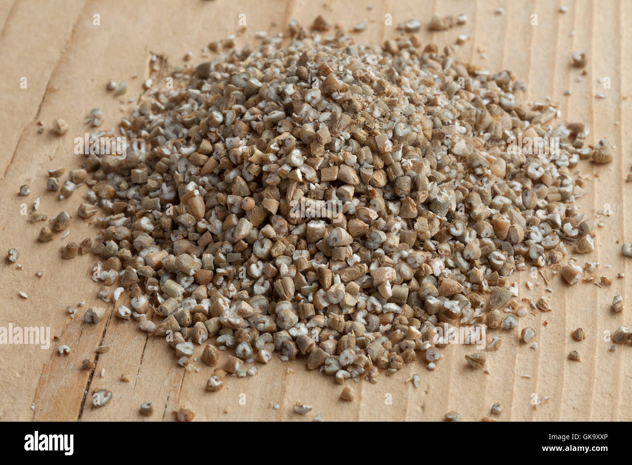 Heap of fresh broken rye seeds Stock Photo