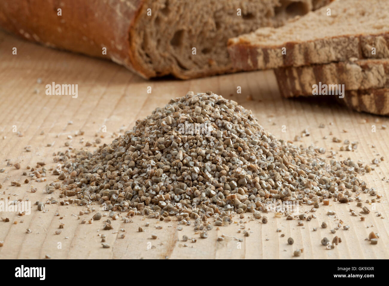 Fresh broken rye seeds and rye bread Stock Photo - Alamy