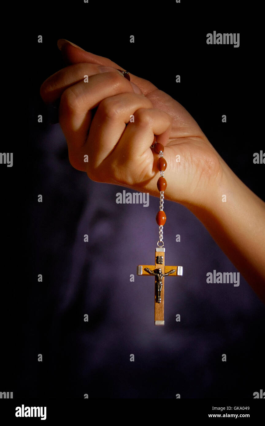 Woman hand rosary hi-res stock photography and images - Alamy