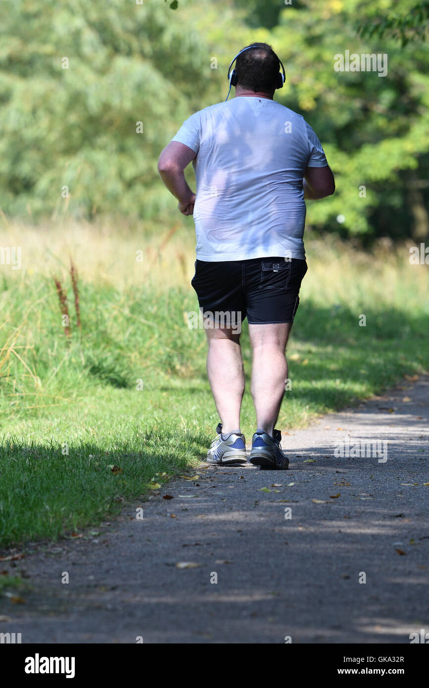 Overweight man jogging hires stock photography and images Alamy