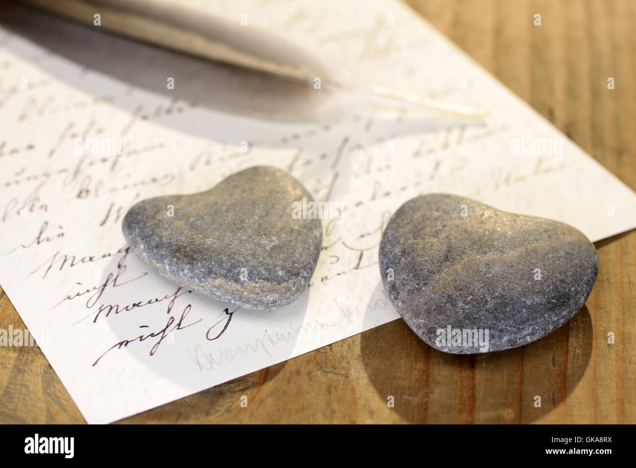 stone heart on old letter Stock Photo