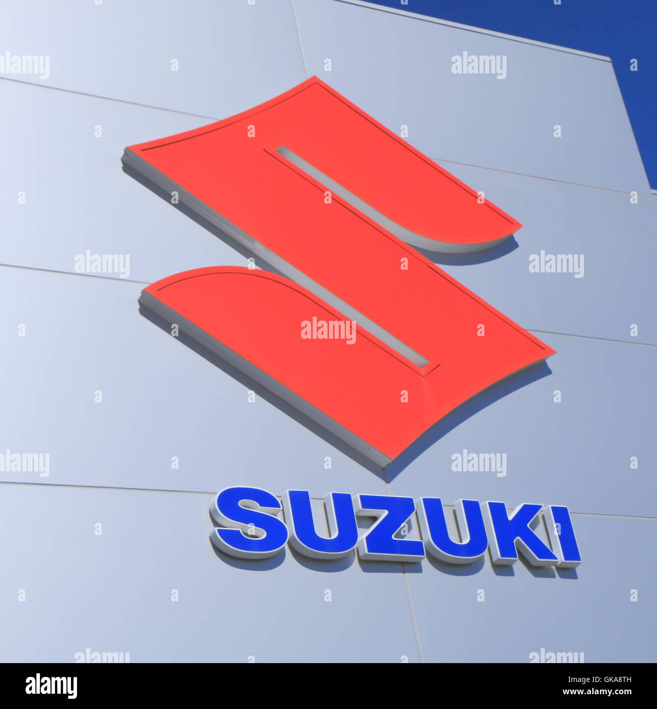 SUZUKI Car manufacture logo, Japanese multinational corporation specializing manufacturing automobiles founded in 1909. Stock Photo
