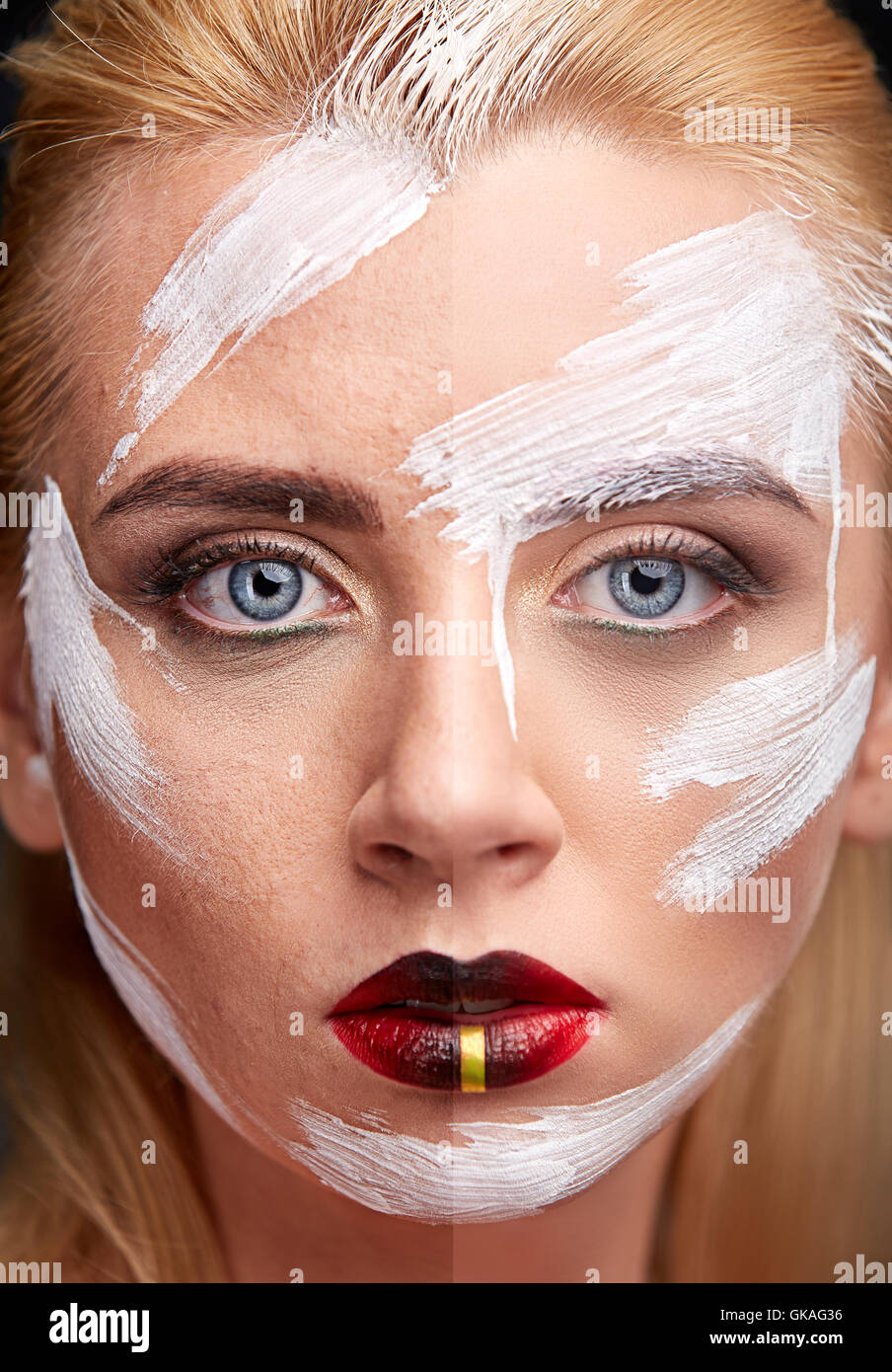 Visage retouching process with half of the face Stock Photo