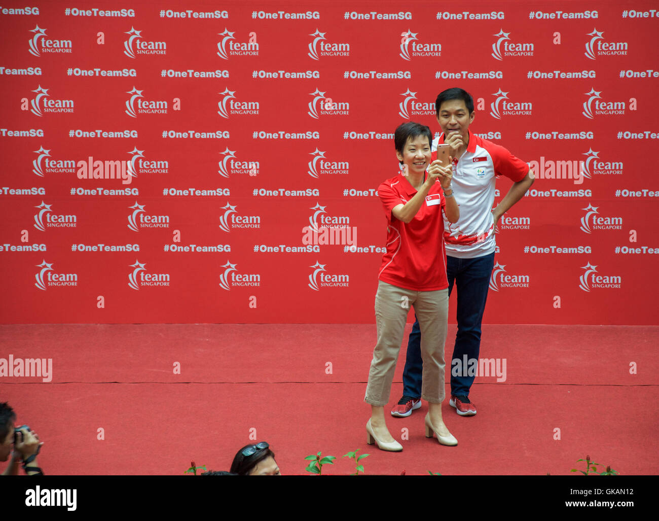Singaporean Ministers Grace Fu Hai Yien and Tan Chuan-Jin waiting for