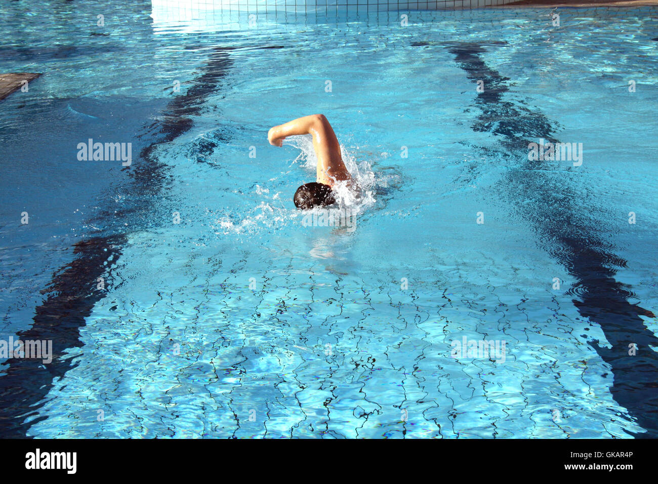 a man swims crawl Stock Photo
