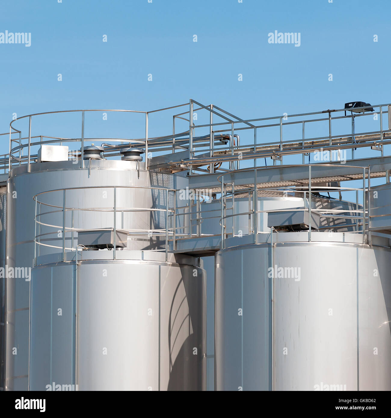 Stainless steel silos . For a milk processing plant. Stock Photo
