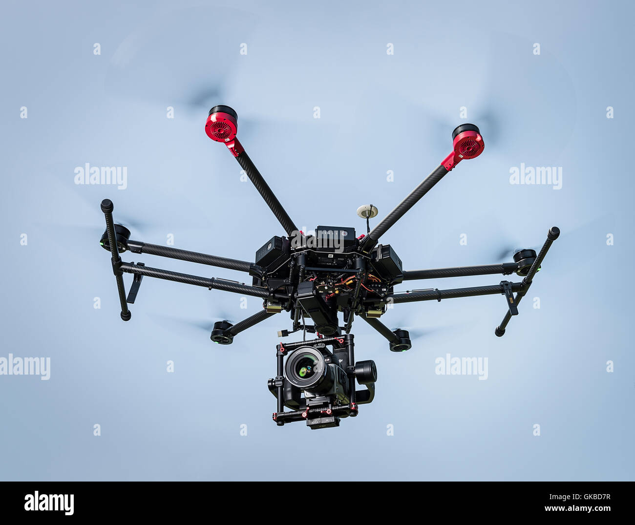 DJI Matrice 600 drone flying with Hasselblad on Ronin Gimbal Stock Photo