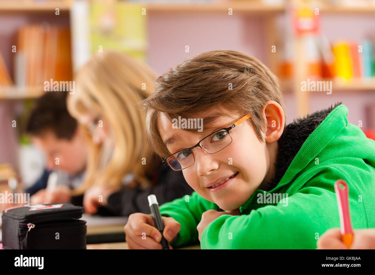 Redoing Homework students in the school to do homework Stock Photo - Alamy