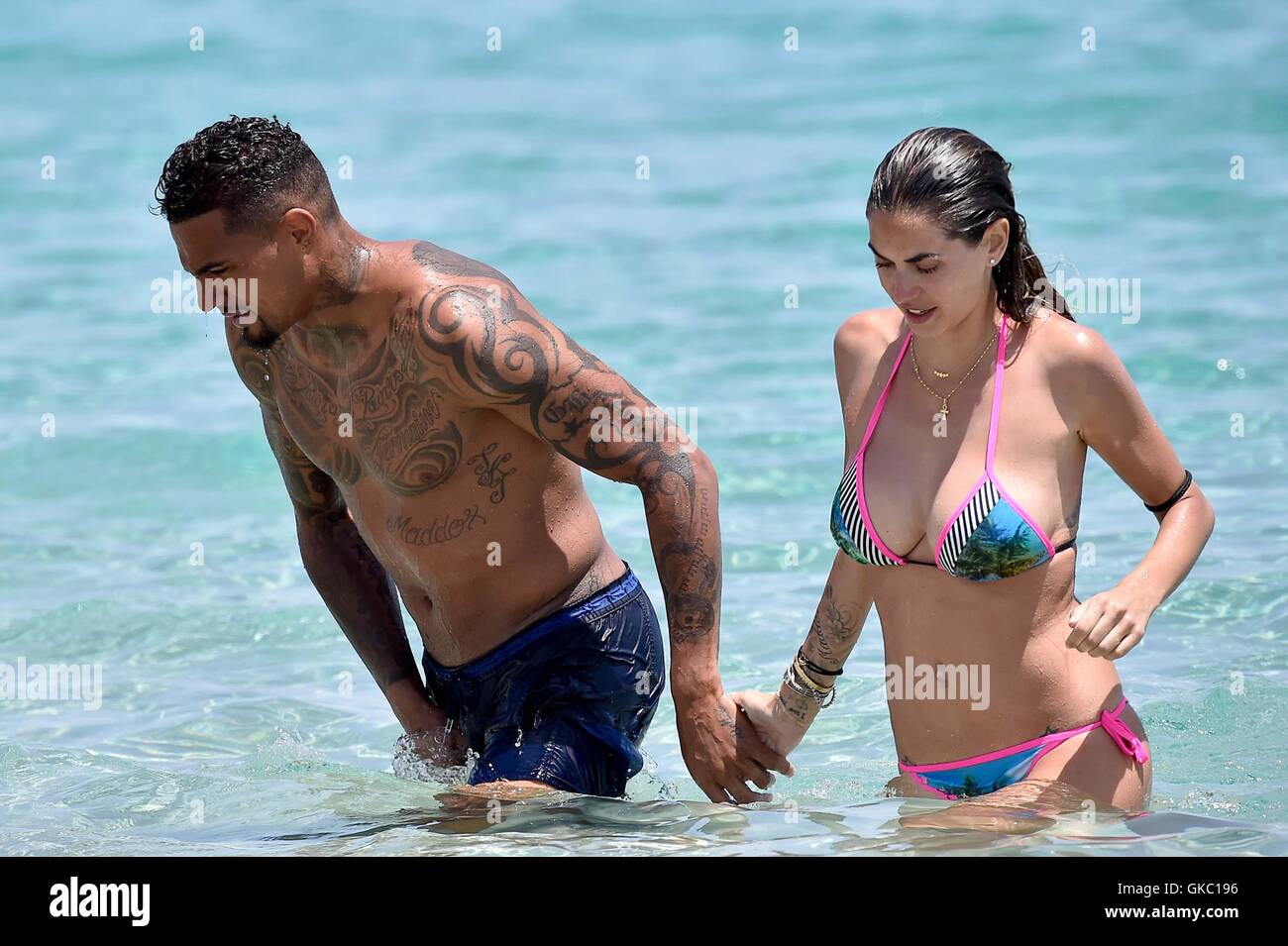 Kevin-Prince Boateng with his wife Melissa Satta and their son Maddox  enjoying a holiday at the white club beach in Sardinia Featuring: Kevin-Prince  Boateng, Melissa Satta, Maddox Prince Boateng Where: Sardinia, Italy