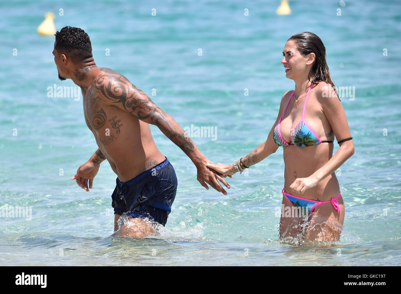 Kevin-Prince Boateng with his wife Melissa Satta and their son Maddox  enjoying a holiday at the white club beach in Sardinia Featuring: Kevin-Prince  Boateng, Melissa Satta, Maddox Prince Boateng Where: Sardinia, Italy