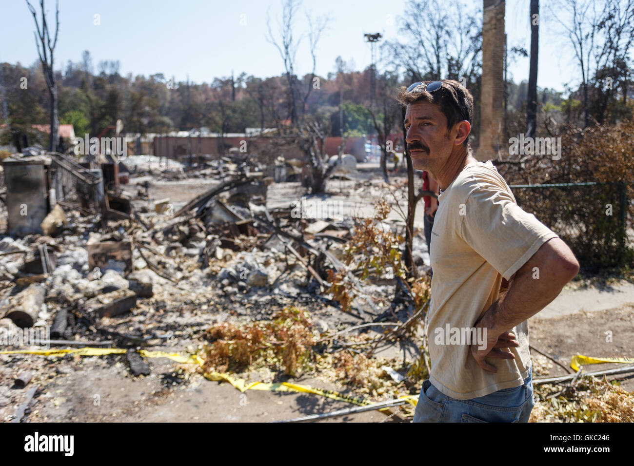 Duane Barbic returns to his home in Lower Lake, CA after it was destroyed by the #ClaytonFIre on Sunday. The house was an histor Stock Photo