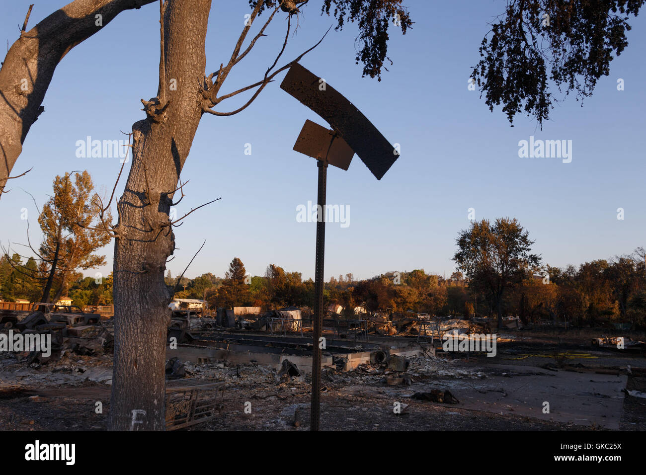 A burnt street sign on a street corner in Lower Lake, CA, where the Clayton Fire burned down 175 homes. Stock Photo
