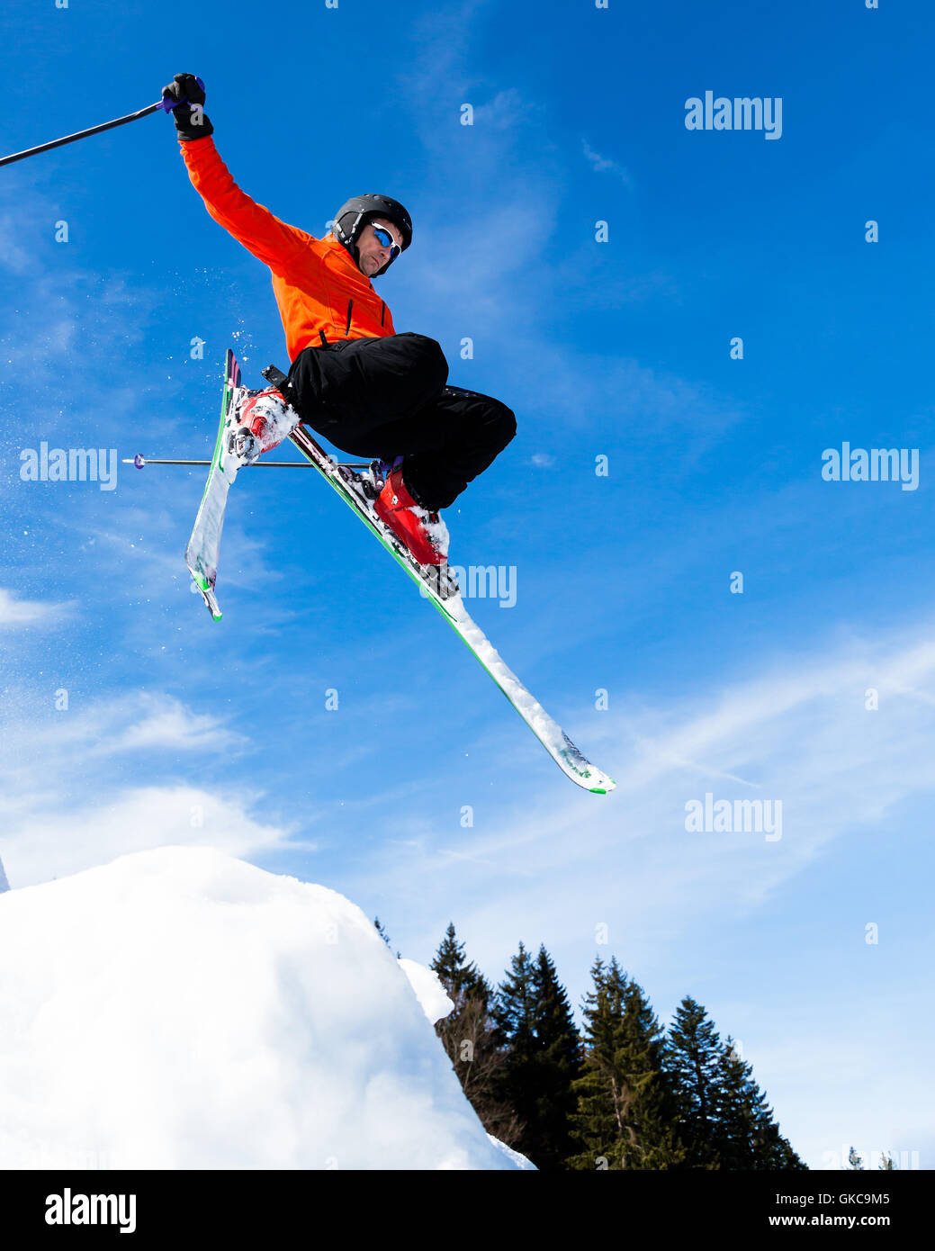 skier in jump Stock Photo