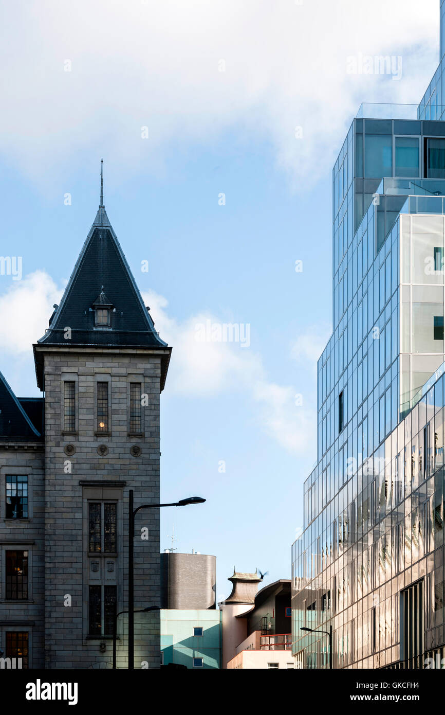 Close up view of old and new buildings. Timmerhuis, Rotterdam, Netherlands. Architect: OMA Rem Koolhaas, 2015. Stock Photo