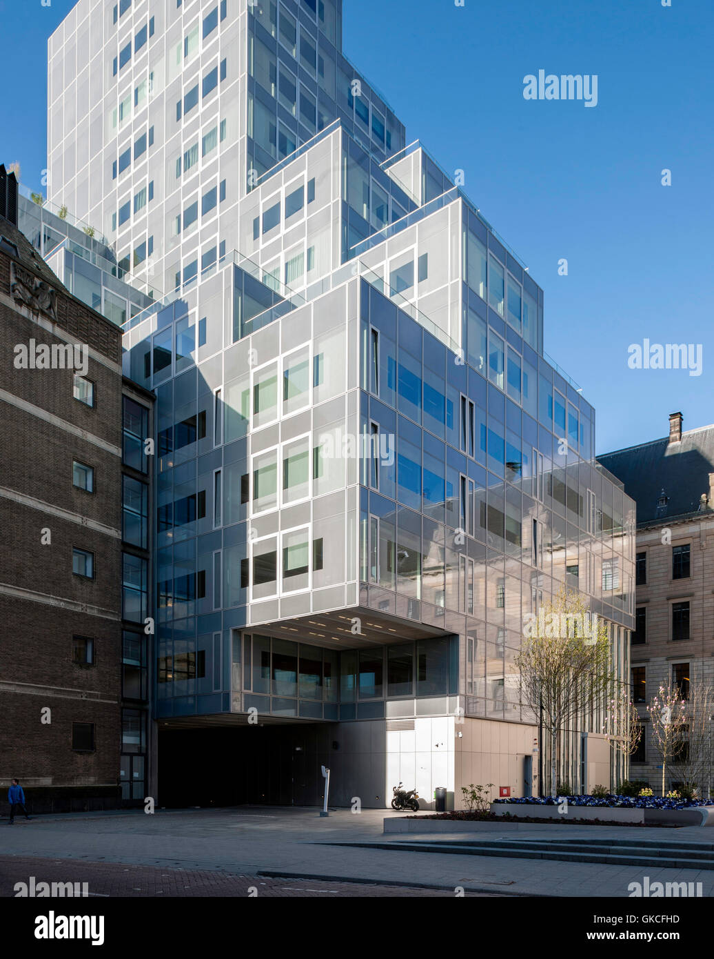 Exterior morning view of rear of building  reflecting old City Council. Timmerhuis, Rotterdam, Netherlands. Architect: OMA Rem Koolhaas, 2015. Stock Photo