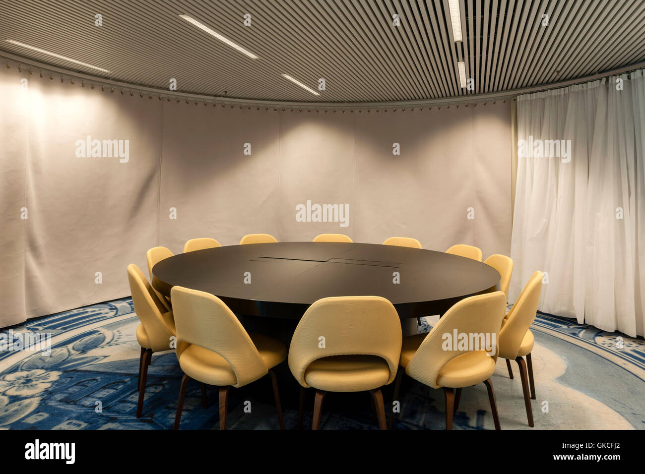 Meeting room showing designers furniture and themed carpet. Timmerhuis, Rotterdam, Netherlands. Architect: OMA Rem Koolhaas, 2015. Stock Photo