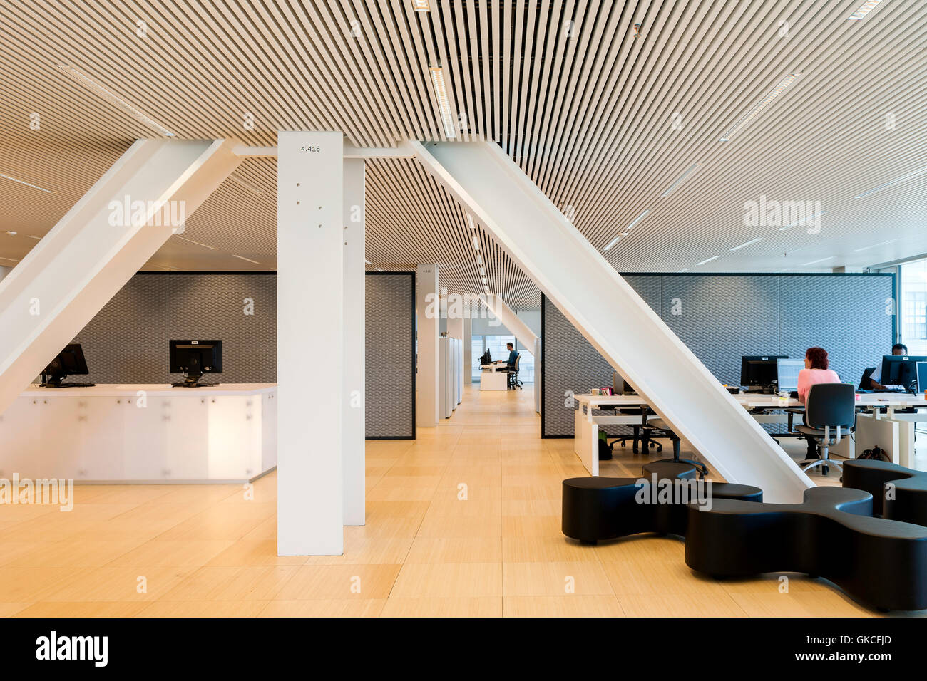 Interior view of office area showing integrated structural pillars. Timmerhuis, Rotterdam, Netherlands. Architect: OMA Rem Koolhaas, 2015. Stock Photo