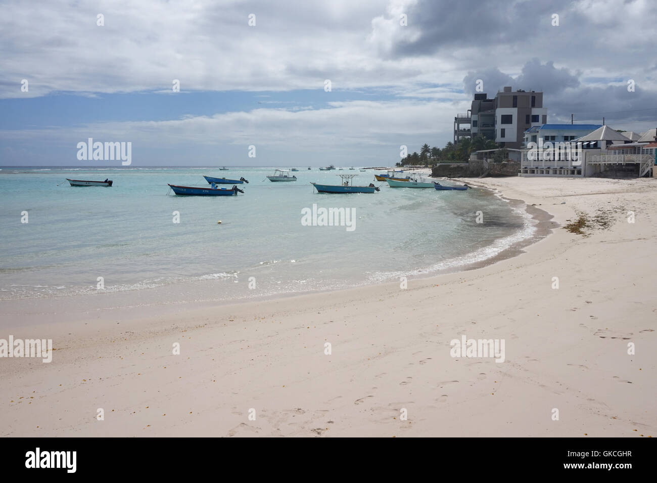 Traditional fishing boats moored at Worthing Beach, Barbados Stock Photo